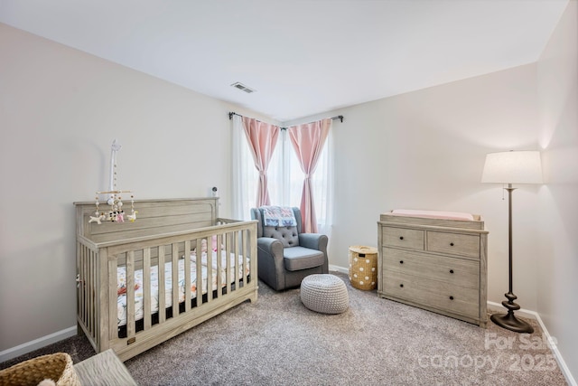 1045 Fairway Ridge Rd NW, Concord, NC 28027 - carpeted bedroom featuring baseboards and a crib