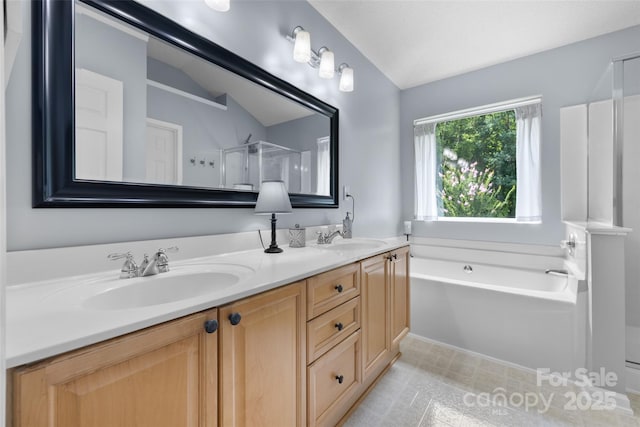 129 Nims Spring Dr, Fort Mill, SC 29715 - full bathroom featuring double vanity, a garden tub, and a shower