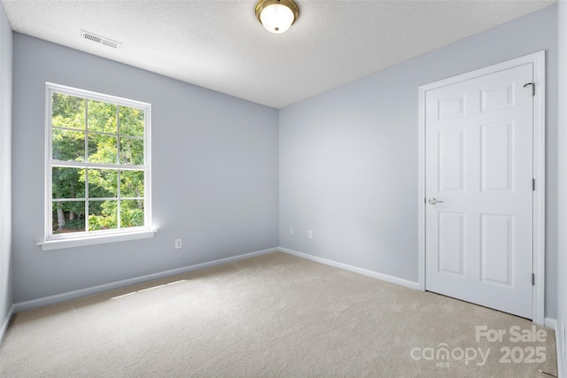 129 Nims Spring Dr, Fort Mill, SC 29715 - carpeted spare room featuring a textured ceiling and baseboards