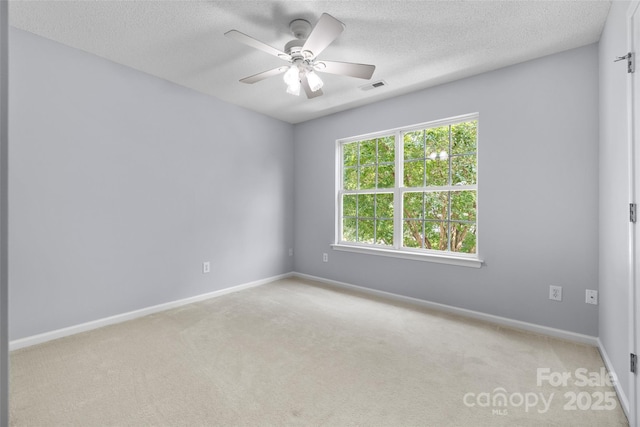 129 Nims Spring Dr, Fort Mill, SC 29715 - carpeted empty room with a textured ceiling and ceiling fan
