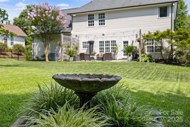 129 Nims Spring Dr, Fort Mill, SC 29715 - rear view of property with a yard and an outdoor hangout area