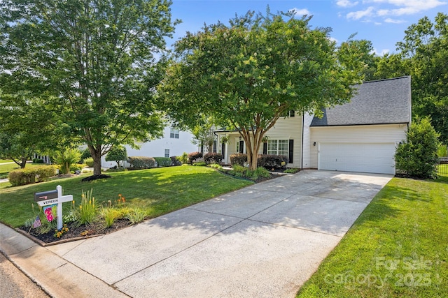 129 Nims Spring Dr, Fort Mill, SC 29715 - view of front of house featuring driveway, a front yard, a garage, and a shingled roof