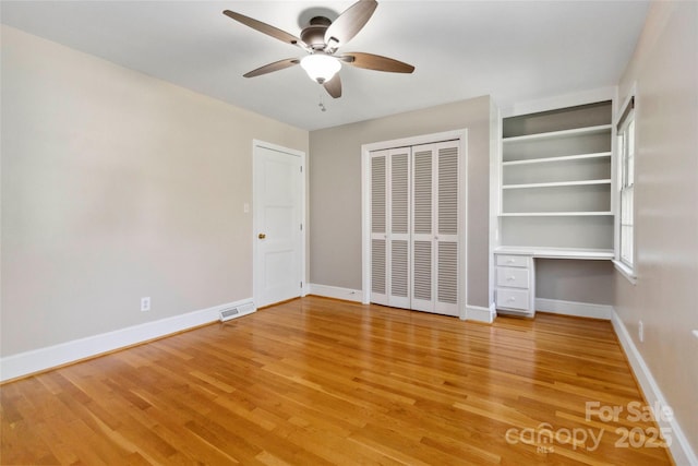 6921 Thermal Rd, Charlotte, NC 28211 - unfurnished bedroom with light wood-style floors, ceiling fan, and a closet
