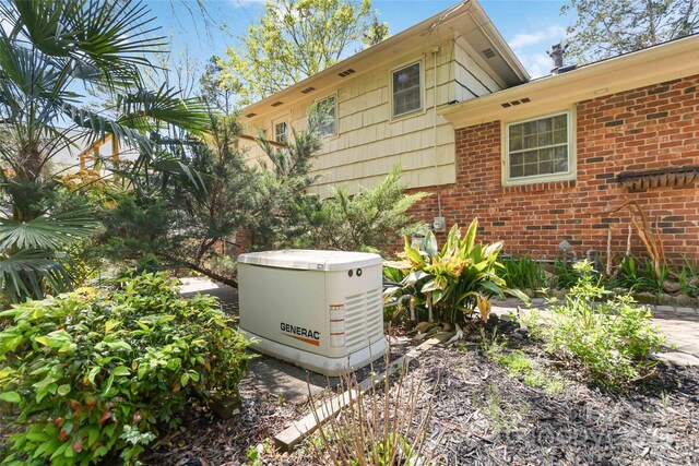6921 Thermal Rd, Charlotte, NC 28211 - exterior view of a power unit and brick siding