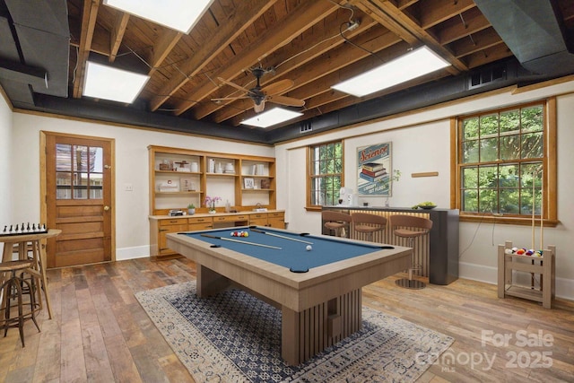 6921 Thermal Rd, Charlotte, NC 28211 - recreation room with a bar, hardwood / wood-style floors, a ceiling fan, and plenty of natural light
