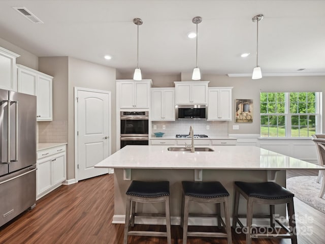 15614 Aviary Orchard Way, Charlotte, NC 28278 - kitchen featuring stainless steel appliances, white cabinetry, tasteful backsplash, and recessed lighting