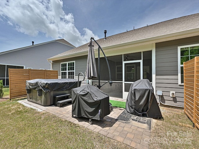 15614 Aviary Orchard Way, Charlotte, NC 28278 - back of property with a hot tub, a patio, a sunroom, and roof with shingles