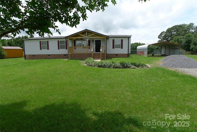 236 Boxwood Church Rd, Mocksville, NC 27028 - manufactured / mobile home with crawl space, a porch, a front yard, and a detached carport