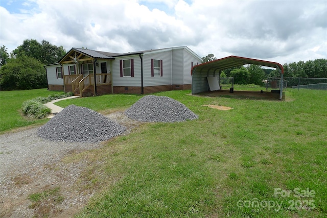 236 Boxwood Church Rd, Mocksville, NC 27028 - manufactured / mobile home featuring a detached carport, crawl space, and driveway