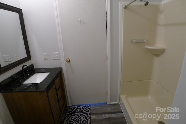 236 Boxwood Church Rd, Mocksville, NC 27028 - full bathroom featuring vanity, wood finished floors, and a shower