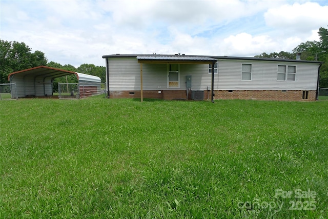 236 Boxwood Church Rd, Mocksville, NC 27028 - rear view of house featuring crawl space and a detached carport