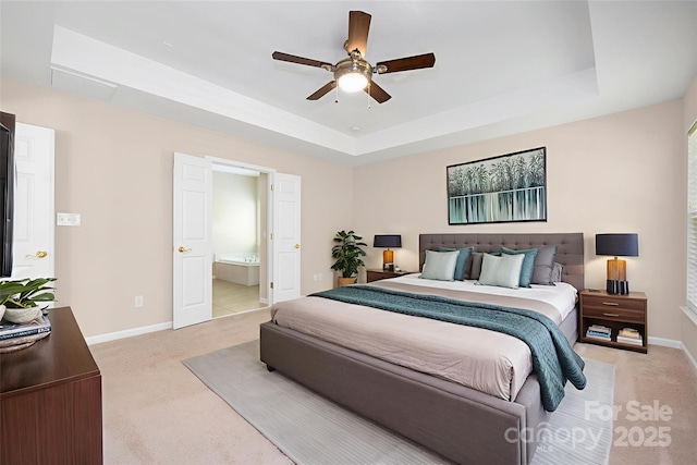 14103 Hiawatha Ct, Huntersville, NC 28078 - bedroom with light colored carpet, a tray ceiling, ensuite bathroom, and a ceiling fan