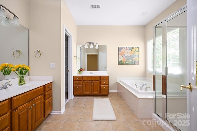14103 Hiawatha Ct, Huntersville, NC 28078 - full bathroom with a bath, two vanities, tile patterned floors, and a stall shower
