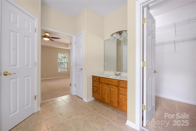 14103 Hiawatha Ct, Huntersville, NC 28078 - bathroom with vanity, a ceiling fan, and tile patterned flooring