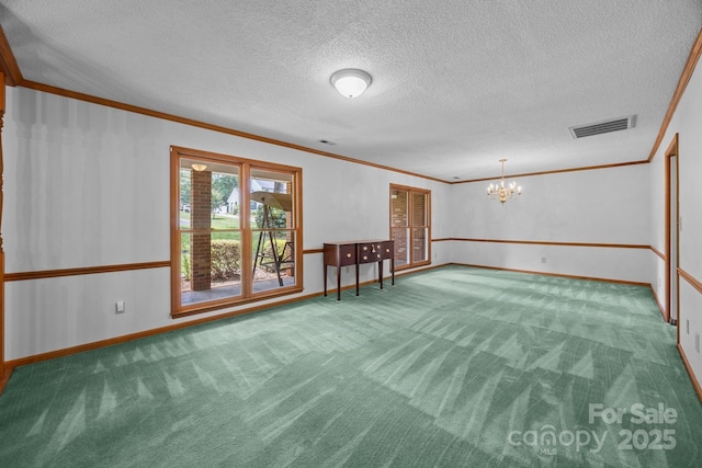 324 Swamp Fox Dr, Fort Mill, SC 29715 - carpeted spare room with a chandelier, ornamental molding, and a textured ceiling