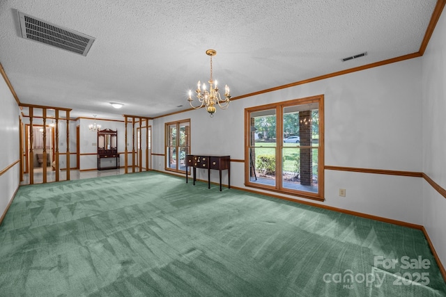 324 Swamp Fox Dr, Fort Mill, SC 29715 - carpeted spare room with a chandelier, a textured ceiling, and ornamental molding