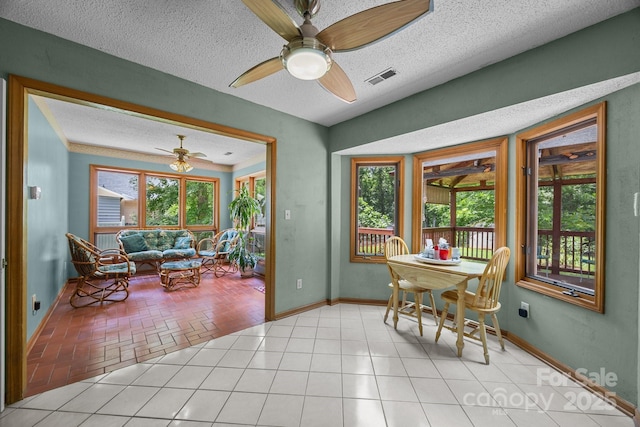324 Swamp Fox Dr, Fort Mill, SC 29715 - dining area with a textured ceiling, a ceiling fan, and healthy amount of natural light