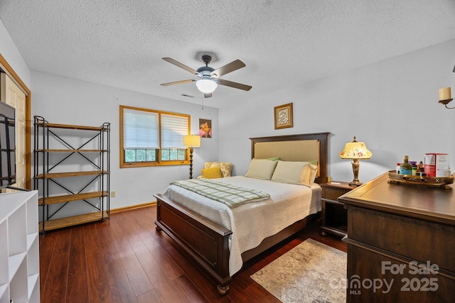 324 Swamp Fox Dr, Fort Mill, SC 29715 - bedroom with a textured ceiling, dark wood-type flooring, and ceiling fan