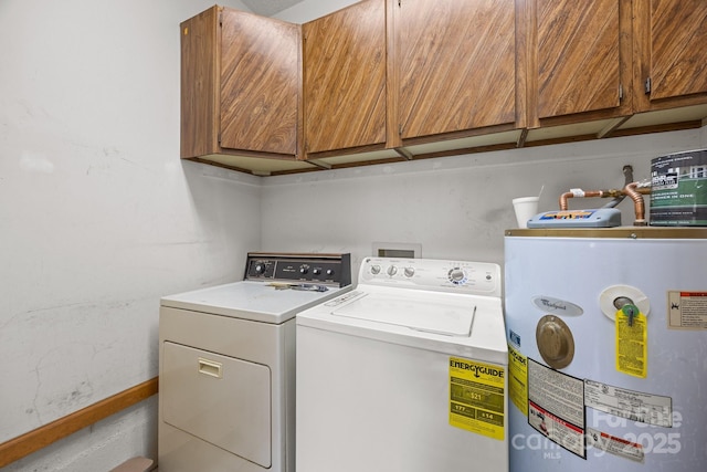 324 Swamp Fox Dr, Fort Mill, SC 29715 - washroom with electric water heater, cabinet space, and washer and dryer