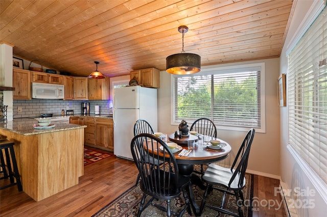 56 Faraway Dr, Cullowhee, NC 28723 - dining space with wood finished floors, vaulted ceiling, and wooden ceiling