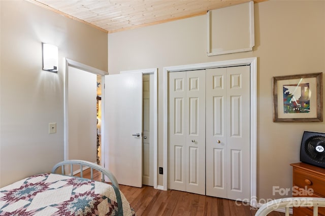 56 Faraway Dr, Cullowhee, NC 28723 - bedroom featuring wood finished floors, ornamental molding, and a closet