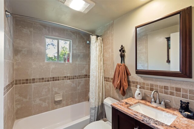 56 Faraway Dr, Cullowhee, NC 28723 - bathroom featuring shower / bath combo with shower curtain, vanity, and decorative backsplash