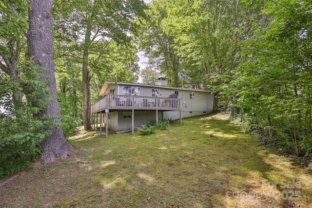 56 Faraway Dr, Cullowhee, NC 28723 - back of property featuring a deck, a chimney, and a yard