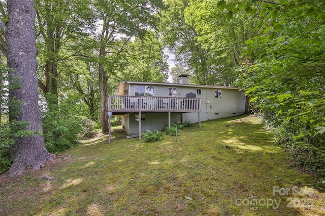 56 Faraway Dr, Cullowhee, NC 28723 - back of house with a wooden deck, a yard, and a chimney
