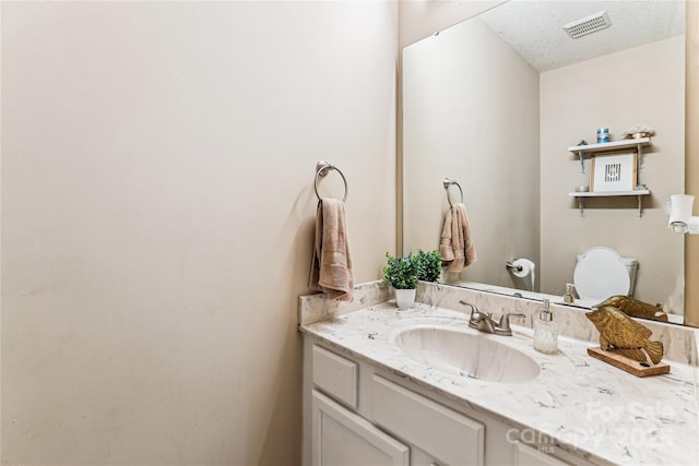 2040 Brantley Creek Dr, Kannapolis, NC 28083 - half bath with vanity and a textured ceiling