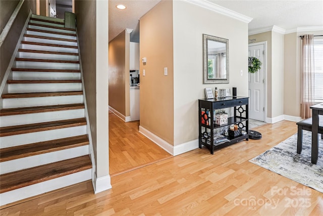 2040 Brantley Creek Dr, Kannapolis, NC 28083 - staircase featuring crown molding, wood finished floors, and recessed lighting