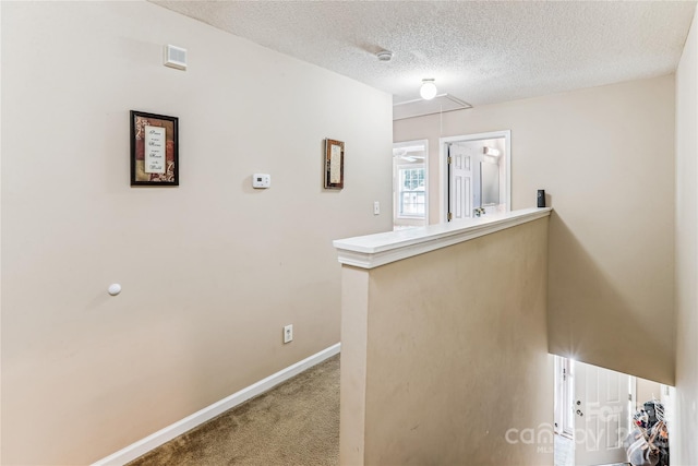 2040 Brantley Creek Dr, Kannapolis, NC 28083 - corridor featuring attic access, carpet flooring, a textured ceiling, and an upstairs landing