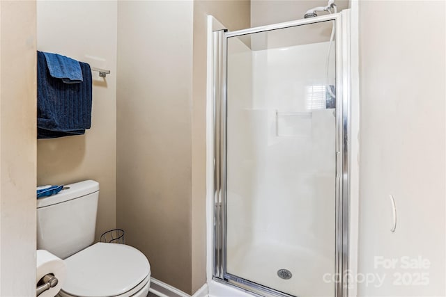 2040 Brantley Creek Dr, Kannapolis, NC 28083 - bathroom featuring a stall shower and toilet