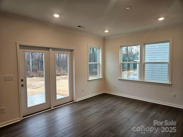 8231 Annsborough Dr NW, Concord, NC 28027 - empty room featuring dark wood-style floors, crown molding, and recessed lighting