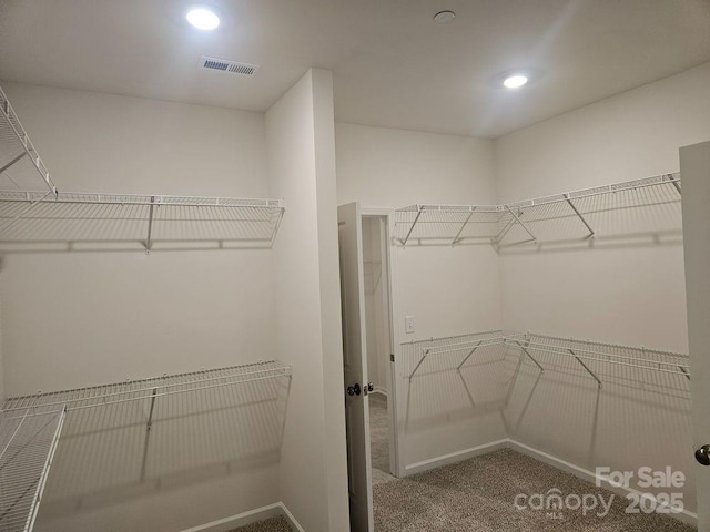 8231 Annsborough Dr NW, Concord, NC 28027 - spacious closet featuring carpet floors