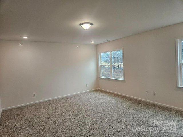 8231 Annsborough Dr NW, Concord, NC 28027 - spare room featuring carpet floors and recessed lighting