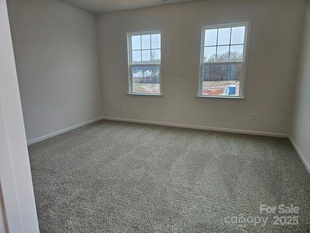 8231 Annsborough Dr NW, Concord, NC 28027 - empty room featuring carpet and baseboards