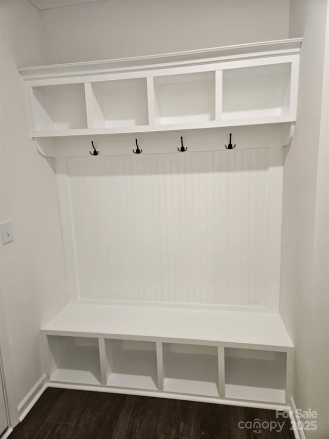 8231 Annsborough Dr NW, Concord, NC 28027 - mudroom featuring dark wood-style flooring and baseboards