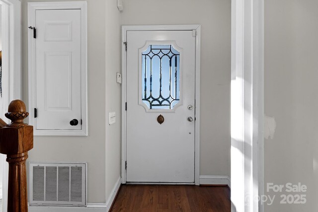 6017 Millbury Ct, Charlotte, NC 28211 - entryway featuring dark wood-style flooring and baseboards