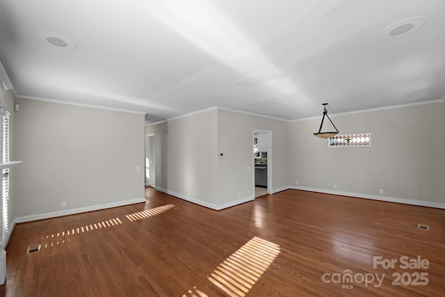 6017 Millbury Ct, Charlotte, NC 28211 - unfurnished living room featuring wood finished floors, ornamental molding, and healthy amount of natural light