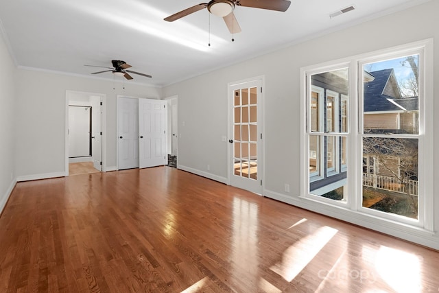6017 Millbury Ct, Charlotte, NC 28211 - unfurnished living room with ornamental molding, a ceiling fan, and wood finished floors