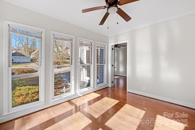 6017 Millbury Ct, Charlotte, NC 28211 - spare room featuring wood finished floors, ornamental molding, and a ceiling fan