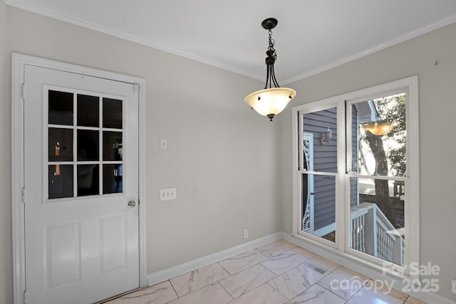 6017 Millbury Ct, Charlotte, NC 28211 - unfurnished dining area with light marble finish floors and crown molding