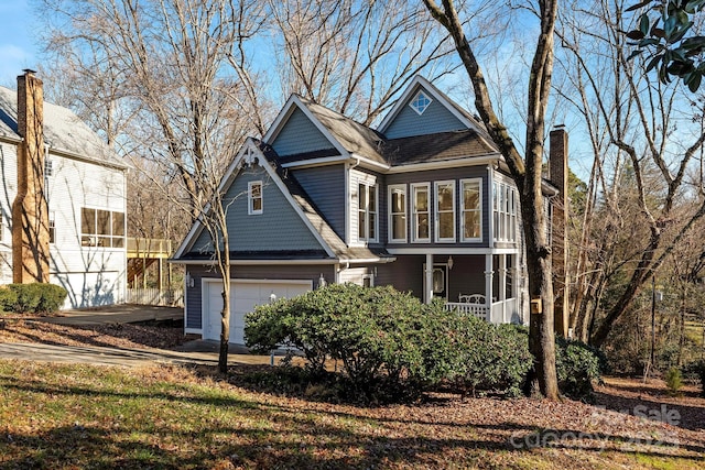 6017 Millbury Ct, Charlotte, NC 28211 - view of front of property with a porch, a chimney, and an attached garage