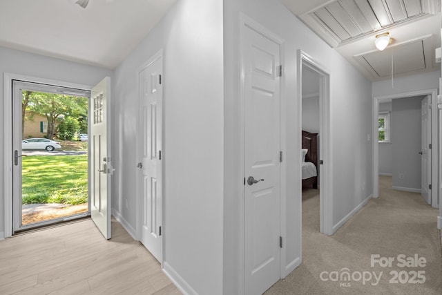 11329 Torino Rd, Matthews, NC 28105 - corridor featuring attic access and plenty of natural light