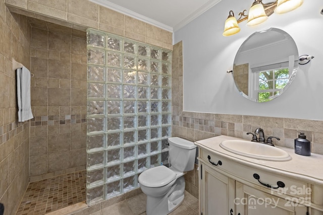 11329 Torino Rd, Matthews, NC 28105 - full bath with tile walls, walk in shower, crown molding, vanity, and tile patterned floors