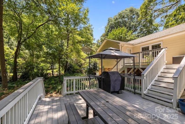 11329 Torino Rd, Matthews, NC 28105 - deck with stairs, a gazebo, and grilling area