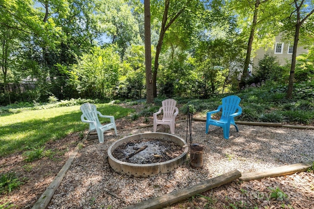 11329 Torino Rd, Matthews, NC 28105 - view of grassy yard with a fire pit