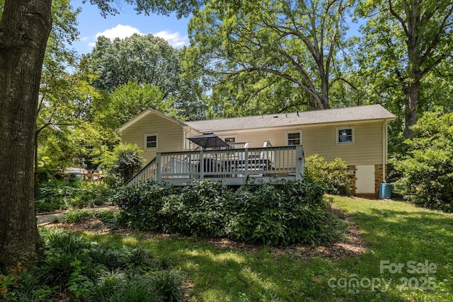 11329 Torino Rd, Matthews, NC 28105 - back of house featuring a deck and a yard