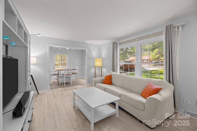 11329 Torino Rd, Matthews, NC 28105 - living area with light wood finished floors and baseboards