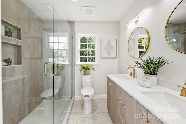 811 Ashmeade Rd, Charlotte, NC 28211 - bathroom featuring healthy amount of natural light, double vanity, and a stall shower